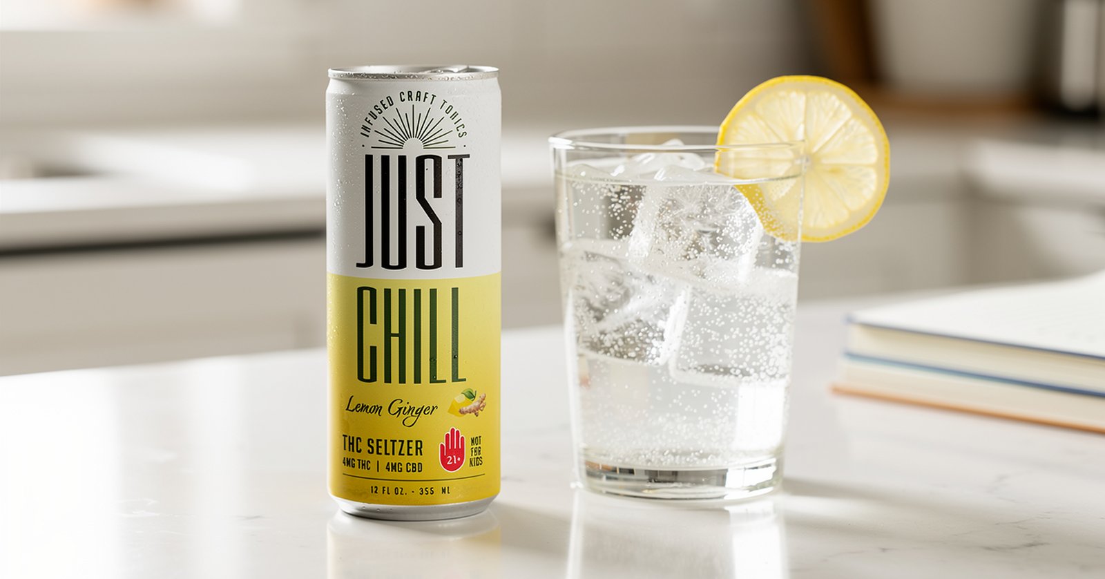 Just Chill Lemon Ginger can beside a glass of ice and lemon in a bright kitchen