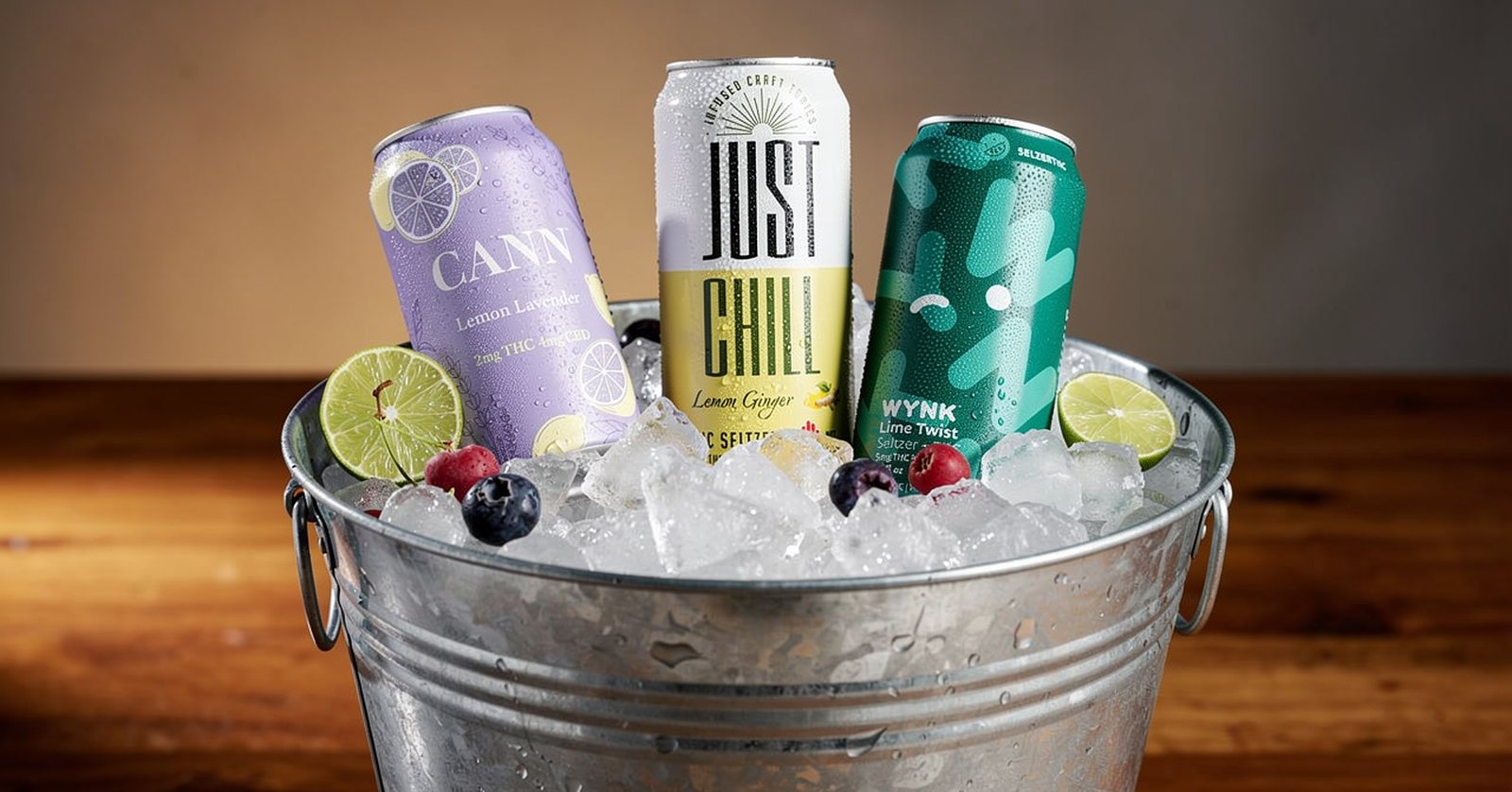 Just Chill, Cann, and Wynk cans chilling together in an ice bucket